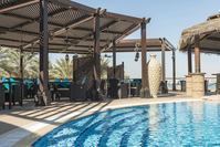 Le Meridién Mina Seyahi Beach Resort - Zwembad